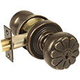 Emtek Petal Bronze Keyed Door Knob Lock Set in Medium Bronze with Style #12 rosette
